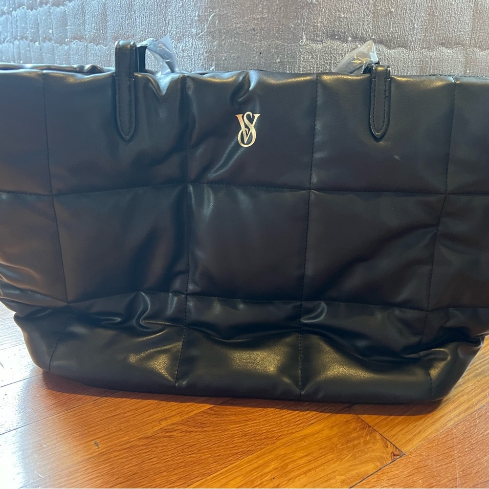 Black Victoria’s Secret quilted tote bag. New with tag.